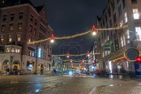 Photo for City scenic from Amsterdam in the Netherlands at night in christmas time - Royalty Free Image