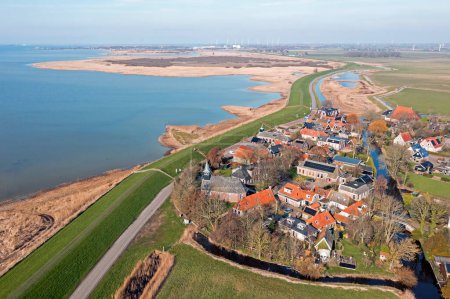 Photo for Aerial from the historical village Gaast at the IJsselmeer in Friesland the Netherlands - Royalty Free Image