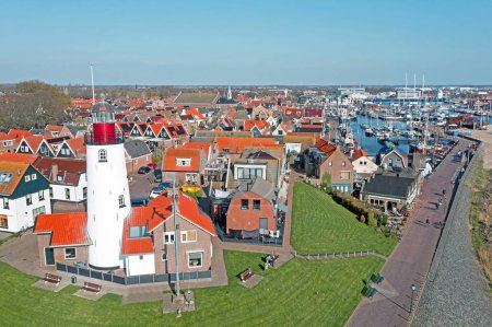 Photo for Aerial from the historical village Urk with the lighthouse in the Netherlands - Royalty Free Image