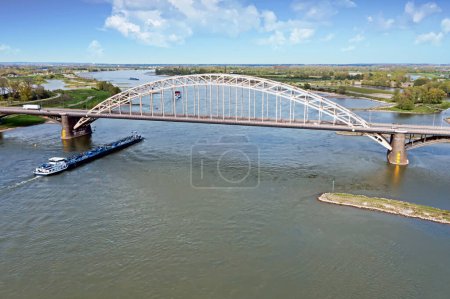 Photo for Aerial from the Waal bridge at the ricer Waal near Nijmegen in the Netherlands - Royalty Free Image