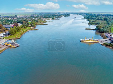 Photo for Aerial from ferries on the river Lek near Schoonhoven at the river Lek in the Netherlands - Royalty Free Image