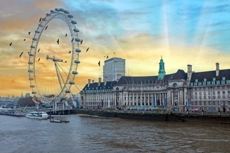 Photo for View of City Of London at sunset with London Eye in London UK - Royalty Free Image