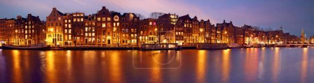 Photo for Panorama from Amsterdam with the Munt tower in the Netherlands at twilight - Royalty Free Image
