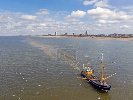 Aerial from a fisher's trawler on the North Sea before the coast of Zandvoort aan Zee in the Netherlands