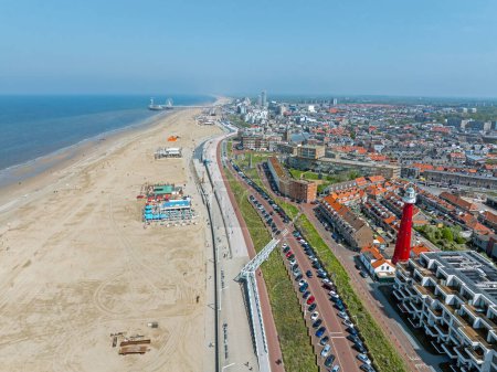 Aerial from Scheveningen with the lighthouse at the North Sea in the Netherlands