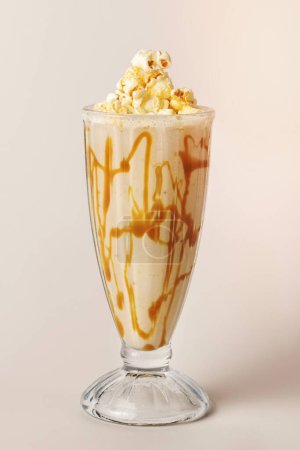 Photo for Caramel popcorn vanilla milkshake - Royalty Free Image
