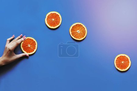 Photo for Delicious orange citrus fruit slices flat lay background - Royalty Free Image