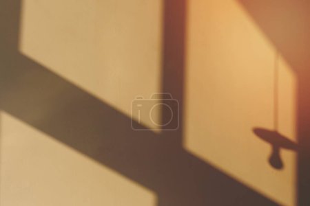 Photo for Late afternoon light on a beige wall - Royalty Free Image