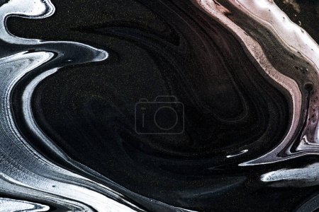 Foto de Black fluid art swirl acrylic paint - Imagen libre de derechos
