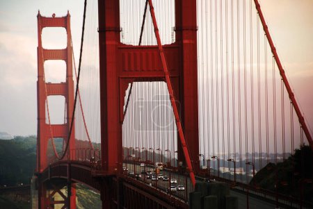 Traffic drives over Golden Gate Bridge.
