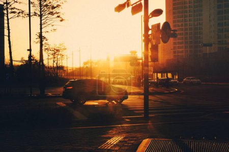 Photo for Early morning city traffic at sunrise. - Royalty Free Image