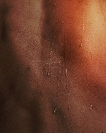 Foto de Closeup back, wet human skin texture photo - Imagen libre de derechos