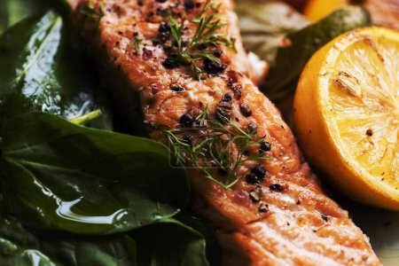Photo for Grilled salmon filet with fresh greens - Royalty Free Image
