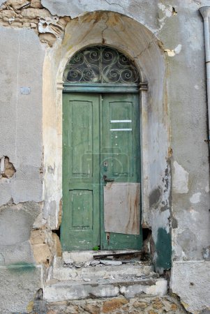 Photo for Abandoned ancient green door in Cyprus - Royalty Free Image