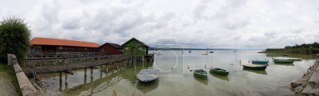 Ammersee, panoramic view over the lake with ships in summer