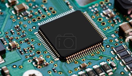Photo for Macro Close up of components and microchips on PC circuit board of Hard Disc Drive - Royalty Free Image