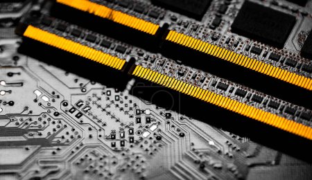 Photo for Macro Close up of computer RAM chip and motherboard on dark background - Royalty Free Image