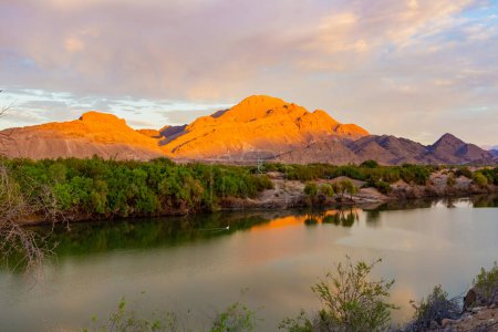 Sunrise over the Orange River in the Richtersveld National Park South Africa, with Namibia in the background, 