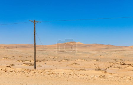 Photo for Telephone transmission lines in the Richtersveld National Park, South Africa - Royalty Free Image