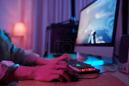 Photo for Hands of teenage boy playing computer game - Royalty Free Image