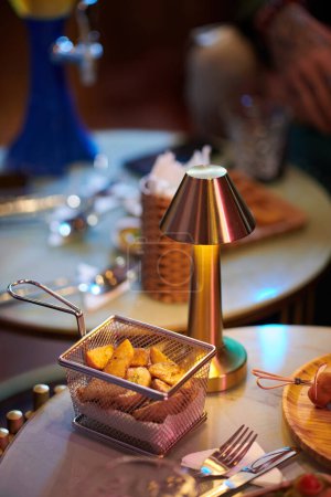 Photo for Hot fries on table in bar, pub or restaurant - Royalty Free Image