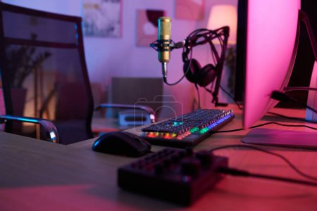 Photo for Desk of lets player with microphone, rgb keyboard and comfortable chair - Royalty Free Image