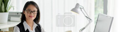 Photo for Banner with portrait of smiling social worker or insurance agent smiling at camera - Royalty Free Image