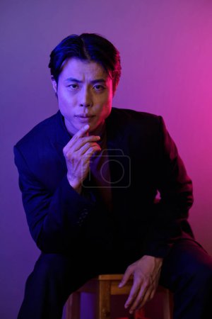 Photo for Portrait of serious confident Asian man in suit looking at camera - Royalty Free Image