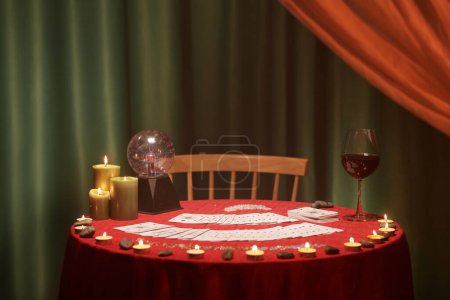 Photo for Table with tarot cards, burning candles and glasses of wine - Royalty Free Image