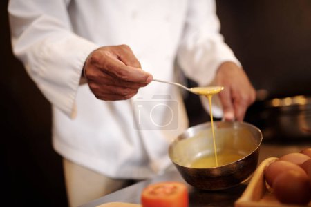 Photo for Closeup image of cook making delicious pasta sauce selective focus - Royalty Free Image
