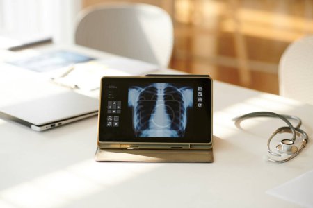 Photo for Tablet computer with lungs x-ray image on screen of tablet computer - Royalty Free Image
