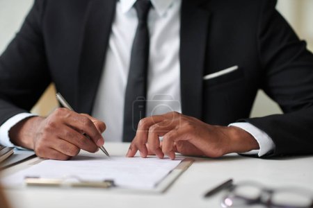Photo for Job candidate signing contract after job interview with hr manager - Royalty Free Image