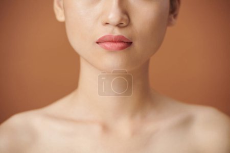 Photo for Close-up image of young woman having full pink lips - Royalty Free Image