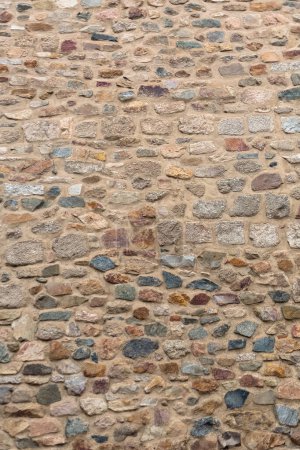Photo for Architecture textures, detailed and rustic of paired masonry granite, traditional spanish and portuguese granite wall, typical iberian orange granite... - Royalty Free Image