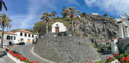 Photo for Madeira Island Portugal - 04 21 2023: Panoramic view at the St. Antonio church on Ponta do Sol, a small touristic village in the city of Funchal, buildings and cliffs, Madeira Island, Portugal - Royalty Free Image