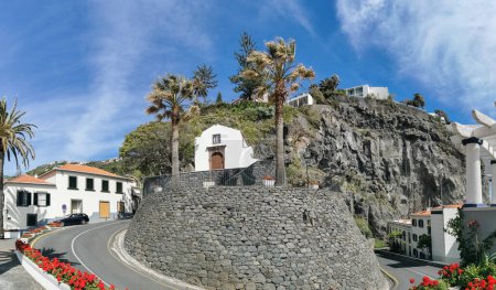 Photo for Madeira Island Portugal - 04 21 2023: Panoramic view at the St. Antonio church on Ponta do Sol, a small touristic village in the city of Funchal, buildings and cliffs, Madeira Island, Portugal - Royalty Free Image