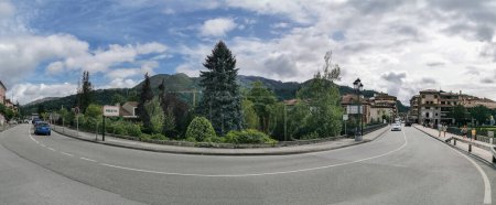 Photo for Leon Spain - 07 05 2021:Panoramic view at the Cangas de Onis downtown city, an touristic city on the Picos de Europa, or Peaks of Europe, Cantabrian Mountains in northern Spain - Royalty Free Image
