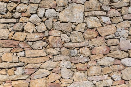 Architektur Texturen, Detailansicht eines traditionellen gekoppelten Granit Mauerwerk, auf einer Festung Burgmauer verwendet...