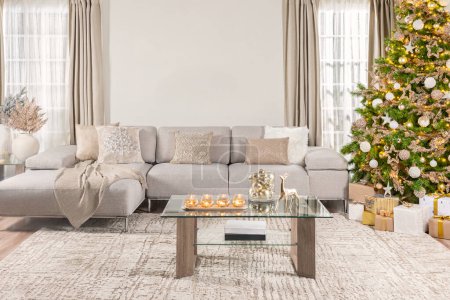 Scandinavian-Style Luxury Living Room Featuring a Cozy Gray Sofa Corner, Glass Coffee Table, and Christmas Tree with Presents, Bathed in Natural Light and Neutral Colors