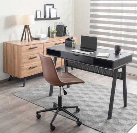 Streamlined Modern Home Office with a Perforated Black Desk, Mid-Century Inspired Tan Leather Office Chair, Matching Wooden Sideboard, Geometric Rug, and a Set of Floating Shelves Above Displaying.
