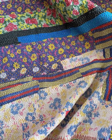 Detail of a colorful hand woven fabrics.