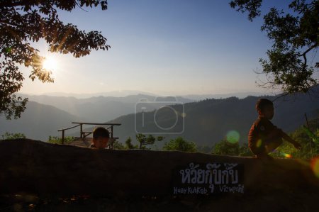 Photo for Thailand - 26 November: Two little children playing at Huay Kub Kab Viewpoint, Chiang Mai Province on 26 November 2019 in Thailand. - Royalty Free Image