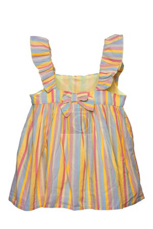 Foto de Summer dress isolated. Closeup of a colorful striped sleeveless baby girl dress isolated on a white background. Children spring fashion. Clipping path. Front view. - Imagen libre de derechos