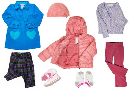 Collage set of little girl autumn or spring clothes isolated on white. Kids apparel collection. Childs fashion clothing outfit. Down jacket, skirt, vest, dresses, shoes, jeans.
