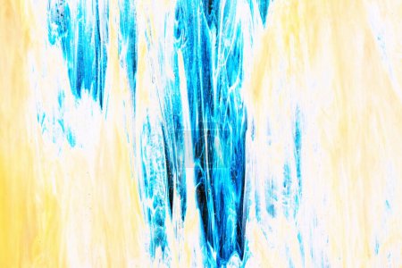 Magnifique peinture abstraite créative artistique bleue et créative faite main. Plan macro d'une texture de fond jaune bleu. Art, toile, motif. Peintures aquarelles.