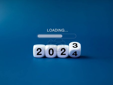 Photo for Loading to Merry christmas and begin a happy new year 2024 banner background. Loading, text appears on white flipping blocks with 2023 change to 2024 year numbers on blue background, minimal style. - Royalty Free Image