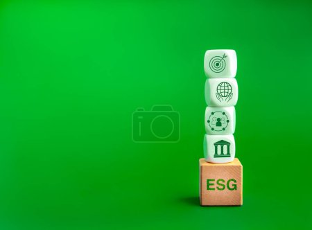 Photo for Environmental, social, and corporate governance (ESG), environment sustainable for save the earthconcept. Acronym text "ESG" on wood cube and icons on white blocks stack isolated on green background. - Royalty Free Image