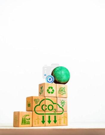 Environmental sustainability, Net zero carbon dioxide reduction concept. 3d globe and target icon on wooden cube stack with ecology system symbols isolated on white vertical background with space.