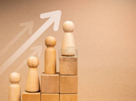 Photo for Population growth, leadership with business success concept.  Wooden figures female and male standing on growth graph steps wood cube blocks with rising up arrows on brown background with copy space. - Royalty Free Image