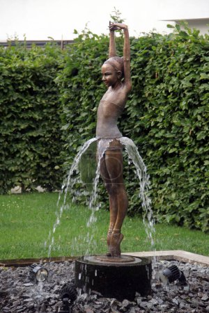 Photo for Dresden, Germany - June 27, 2023: Fountain with bronze sculpture Primavera II by Malgorzata Chodakowska, a Polish-born sculptor living in Dresden. - Royalty Free Image